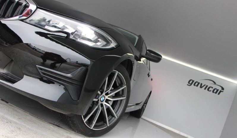 
								BMW 320e Touring full									