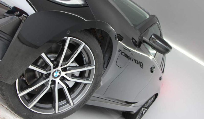 
								BMW 320e Touring full									