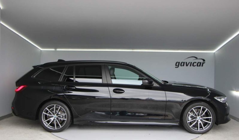 
								BMW 320e Touring full									