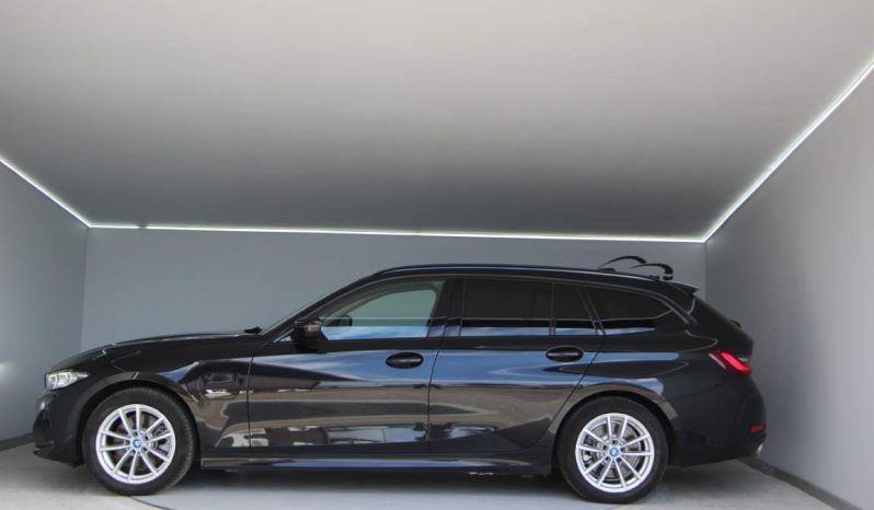 
								BMW 320e Touring full									