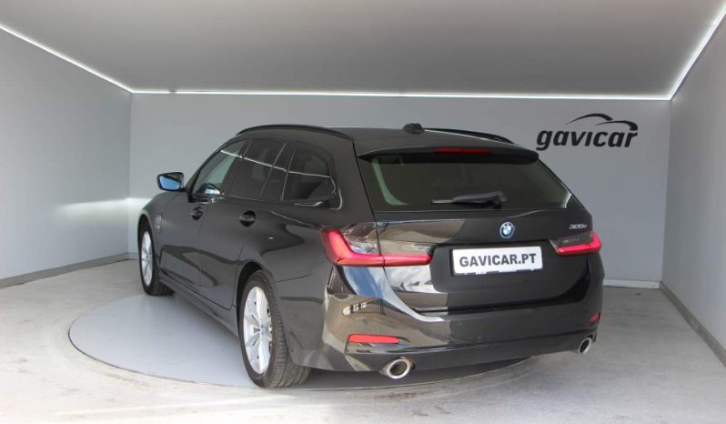 
								BMW 320e Touring full									